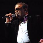 Ron Isley singing onstage