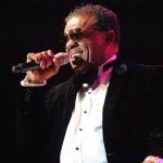 Ron Isley singing onstage