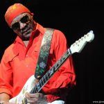 Ernie Isley playing guitar onstage