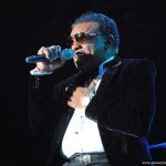 Ron Isley singing onstage