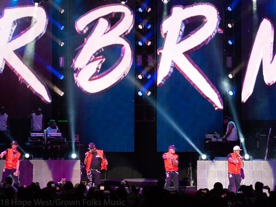 Bobby Brown, Ricky Bell, Mike Bivins and Ronnie Devoe from group RBRM performing at State Bank Amphitheatre Chastain Park in Atlanta
