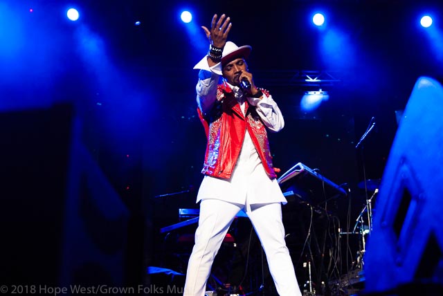 Teddy Riley performing on stage at the State Farm Arena for the 