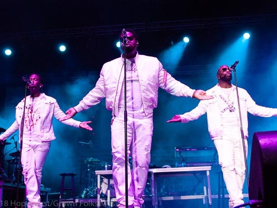 Boyz II Men performing on stage at the State Farm Arena for the 