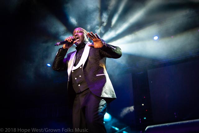 Johnny Gill performing on stage at the State Farm Arena for the 