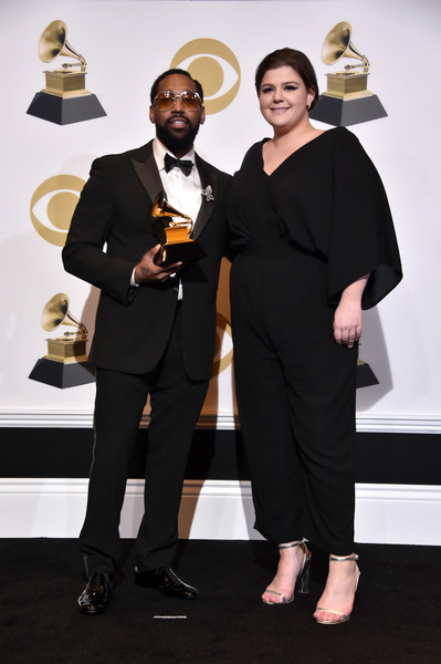 PJ Morton and YEBBA posing on the Grammy Red Carpet after winning Best Traditional R&B Performance.