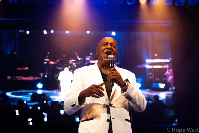 Peabo Bryson performing onstage in Atlanta