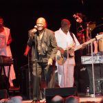 Walter Williams of The O'Jays performing onstage at Chastain Park